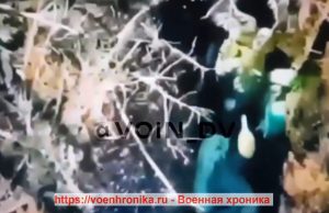 Warleaks 00433 Zrzut granatu z quadkoptera na leżącego w okopie żołnierza ukraińskiego